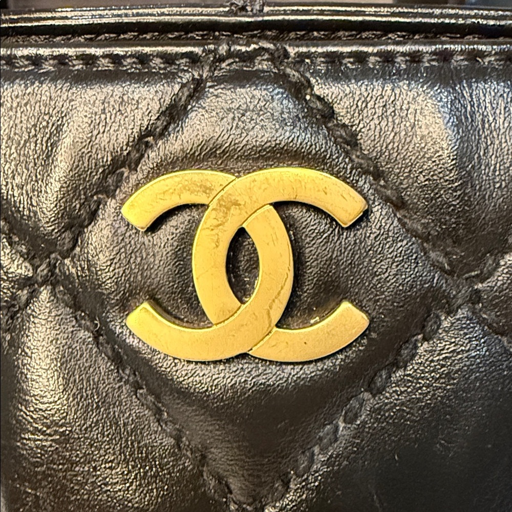 CHANEL Black Quilted Handbag with Gold Accent - Picture 2 of 13